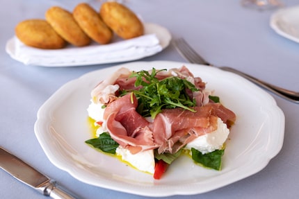 A popular starter at Monarch is prosciutto and Buffalo mozzarella served with crispy...