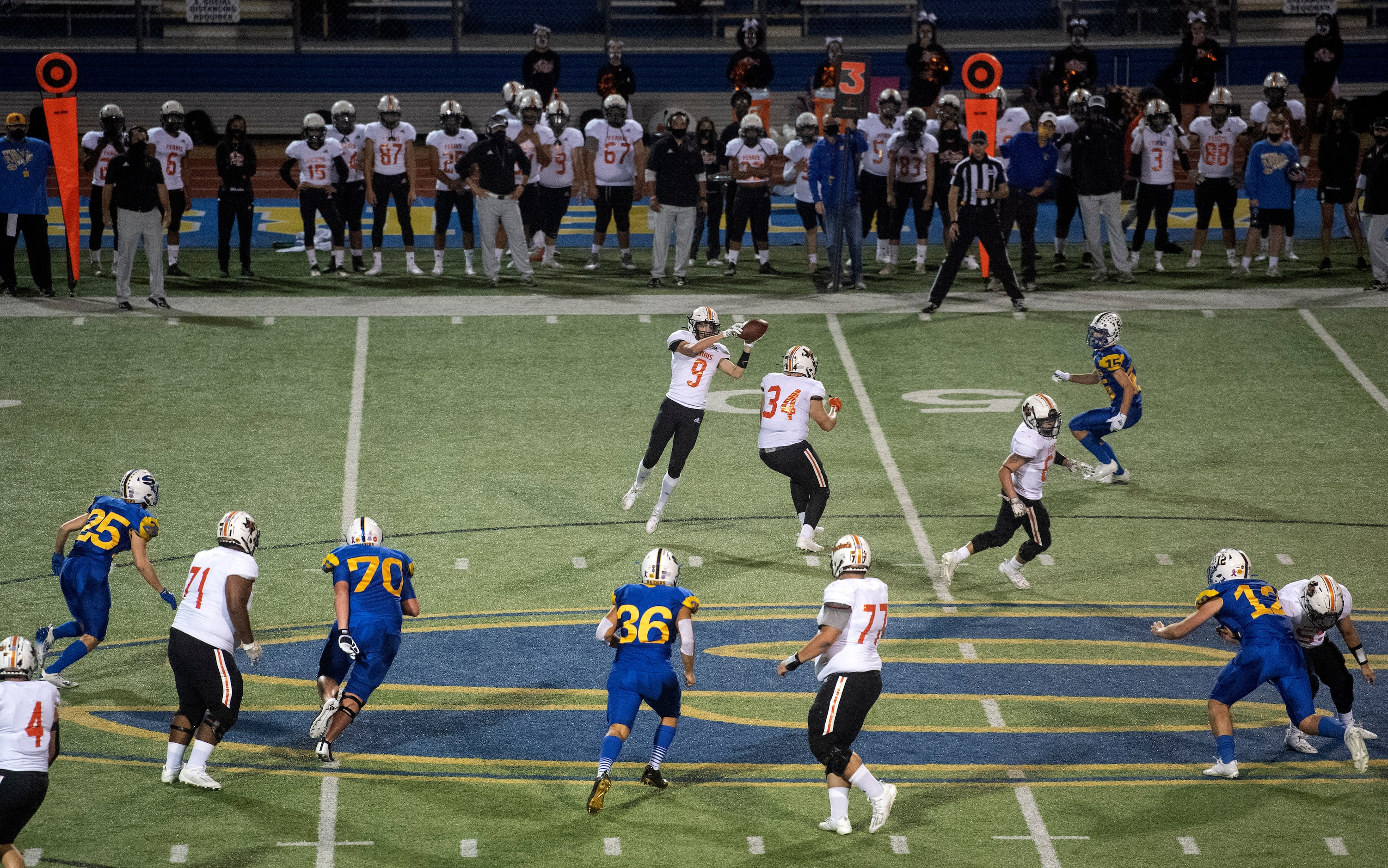 Ferris senior wide receiver Brendon Winsor (9) makes a catch in the first half of a...