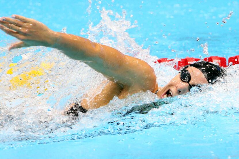 USA's Dana Vollmer competes in the women's 4x200 meter freestyle relay at Aquatics Centre...