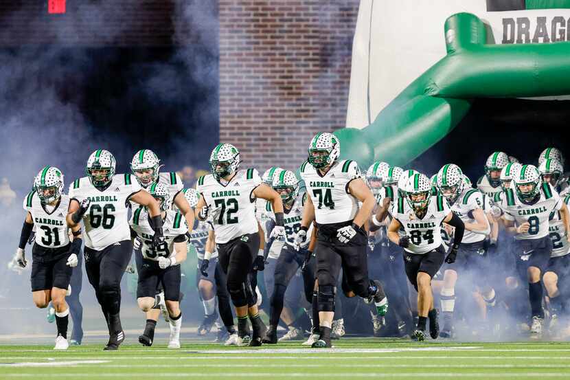 Southlake Carroll takes the field before the second half of their Class 6A Division I state...