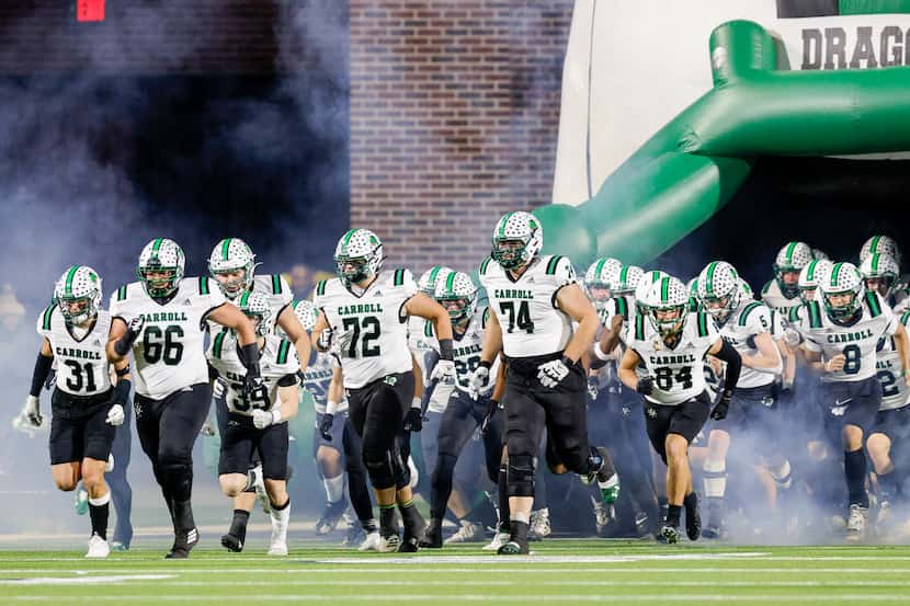 Southlake Carroll takes the field before the second half of their Class 6A Division I state...