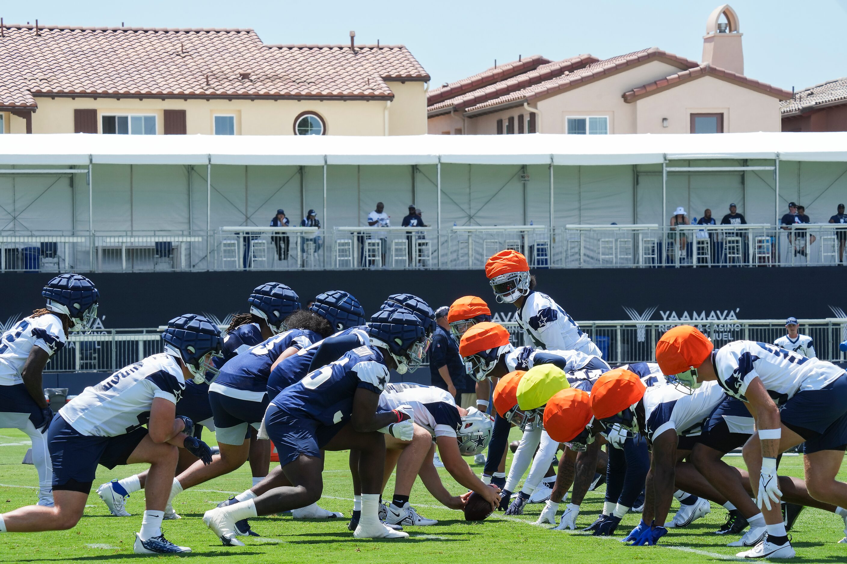 Fans watch from VIP tents during the first practice of the Dallas Cowboys training camp on...