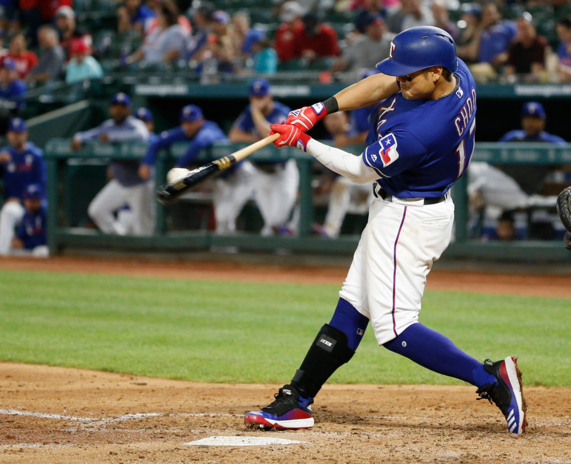 Texas Rangers' Shin-Soo Choo (17) hits a triple against the Los Angeles Angels during the...