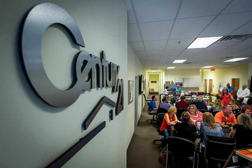 Realtors gather for a happy hour at Century 21 Judge Fite offices in Mansfield. 