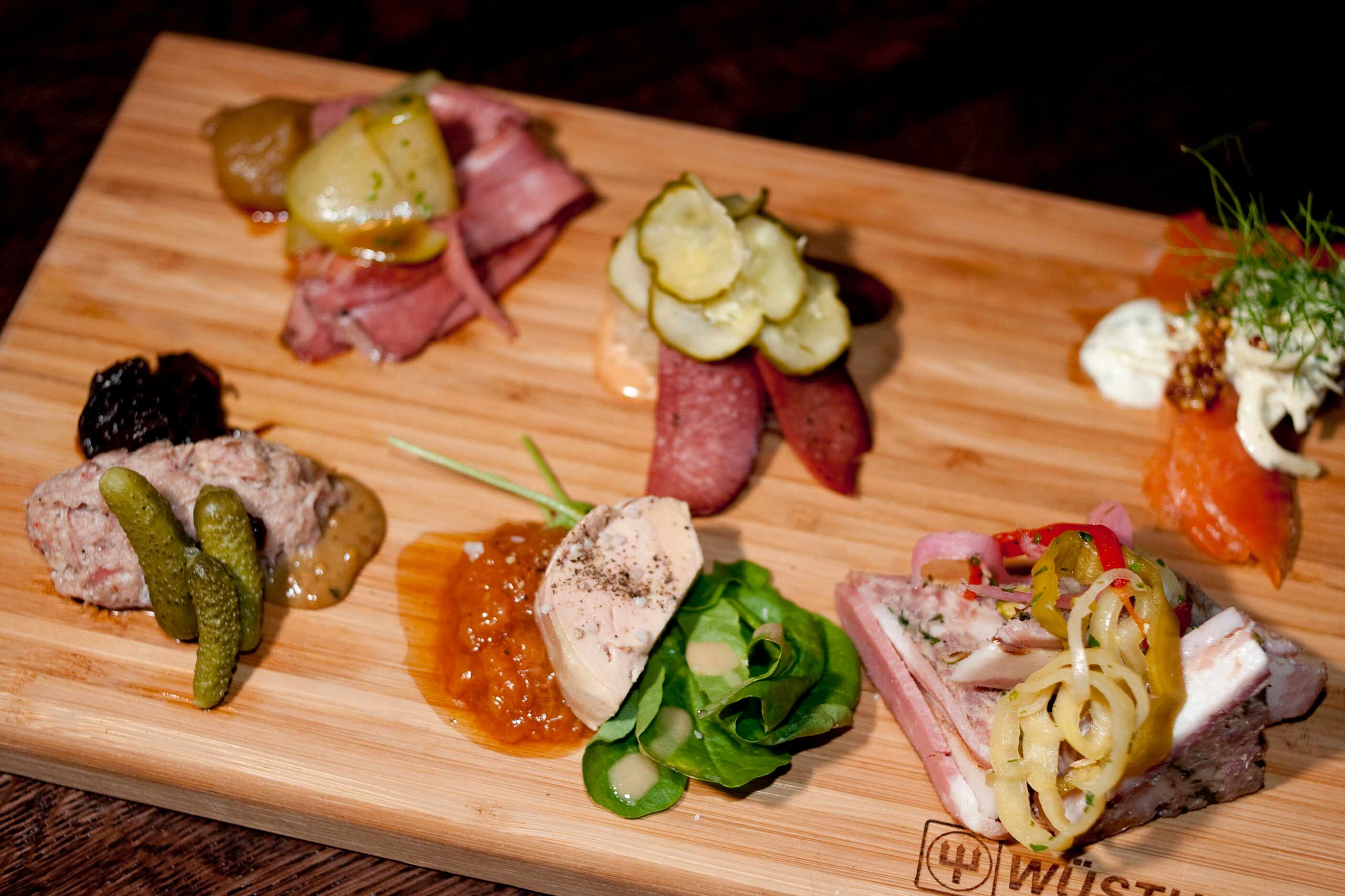 The charcuterie Big Board at Boulevardier can come with optional foie gras, center, as...