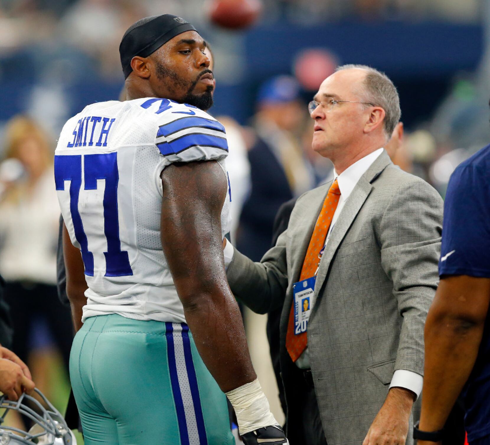 Dallas Cowboys offensive tackle Tyron Smith (77) and center Joe Looney (73)  share a laugh during an NFL football training camp in Frisco, Texas,  Sunday, Aug. 23, 2020. (AP Photo/Michael Ainsworth Stock Photo - Alamy