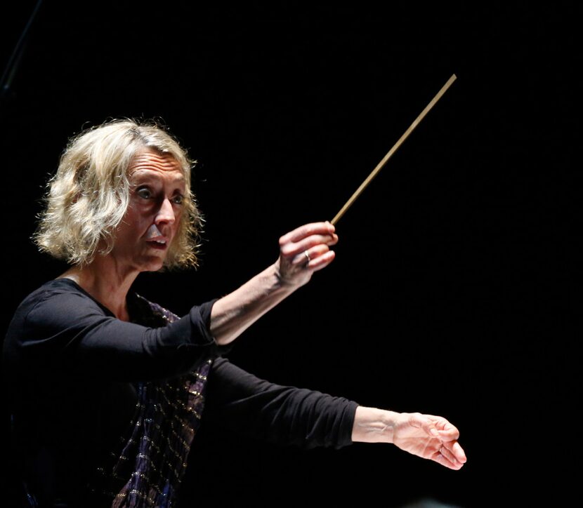 Conductor Nicole Paiement leads the orchestra during a dress rehearsal.