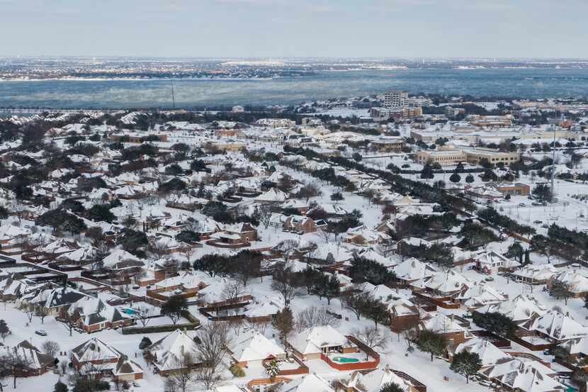 An aerial view of snow-covered Rockwall neighborhoods looking northwest on Feb. 15.