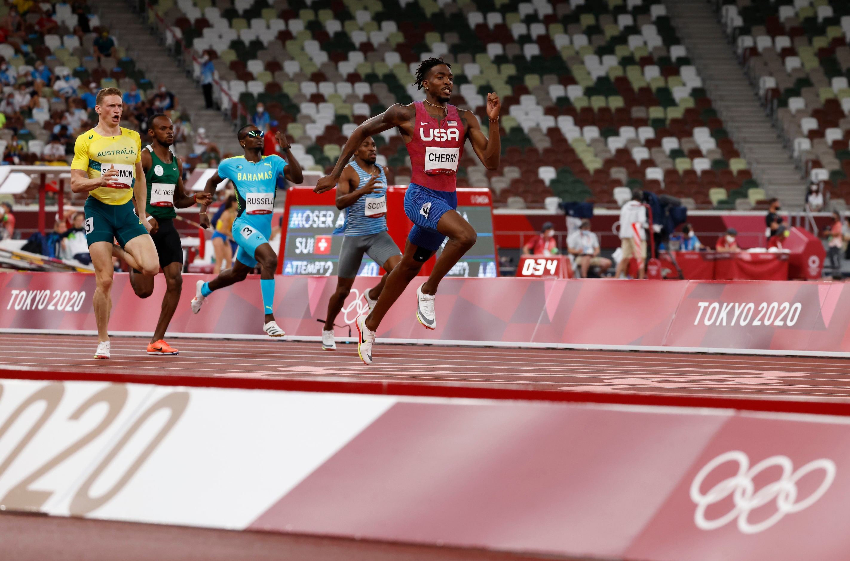 USA’s Michael Cherry races to the finish in the men’s 400 meter semifinal during the...