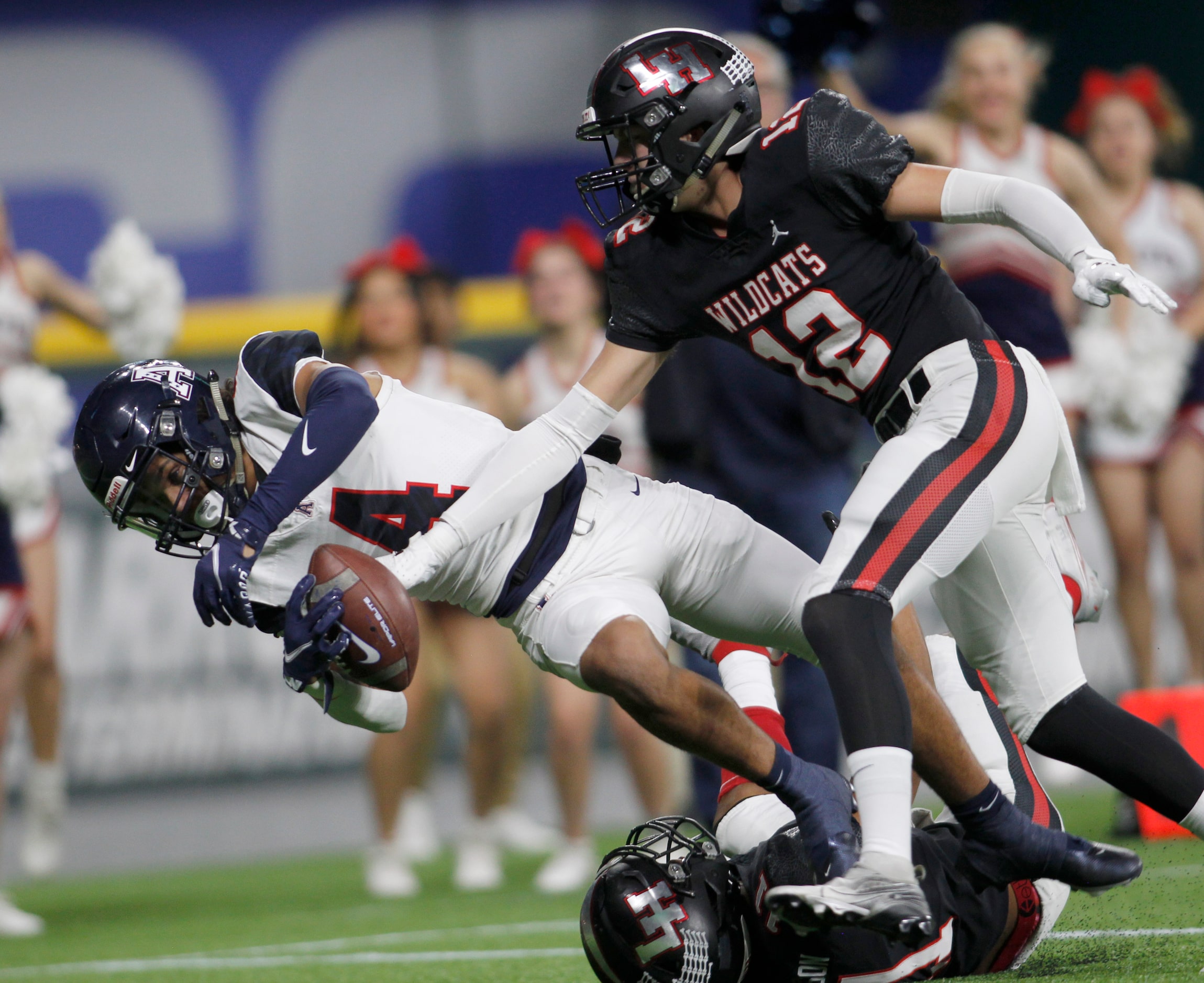 Lake Highlands defensive back carson Klein (12) reaches in to break-up a pass intended for...