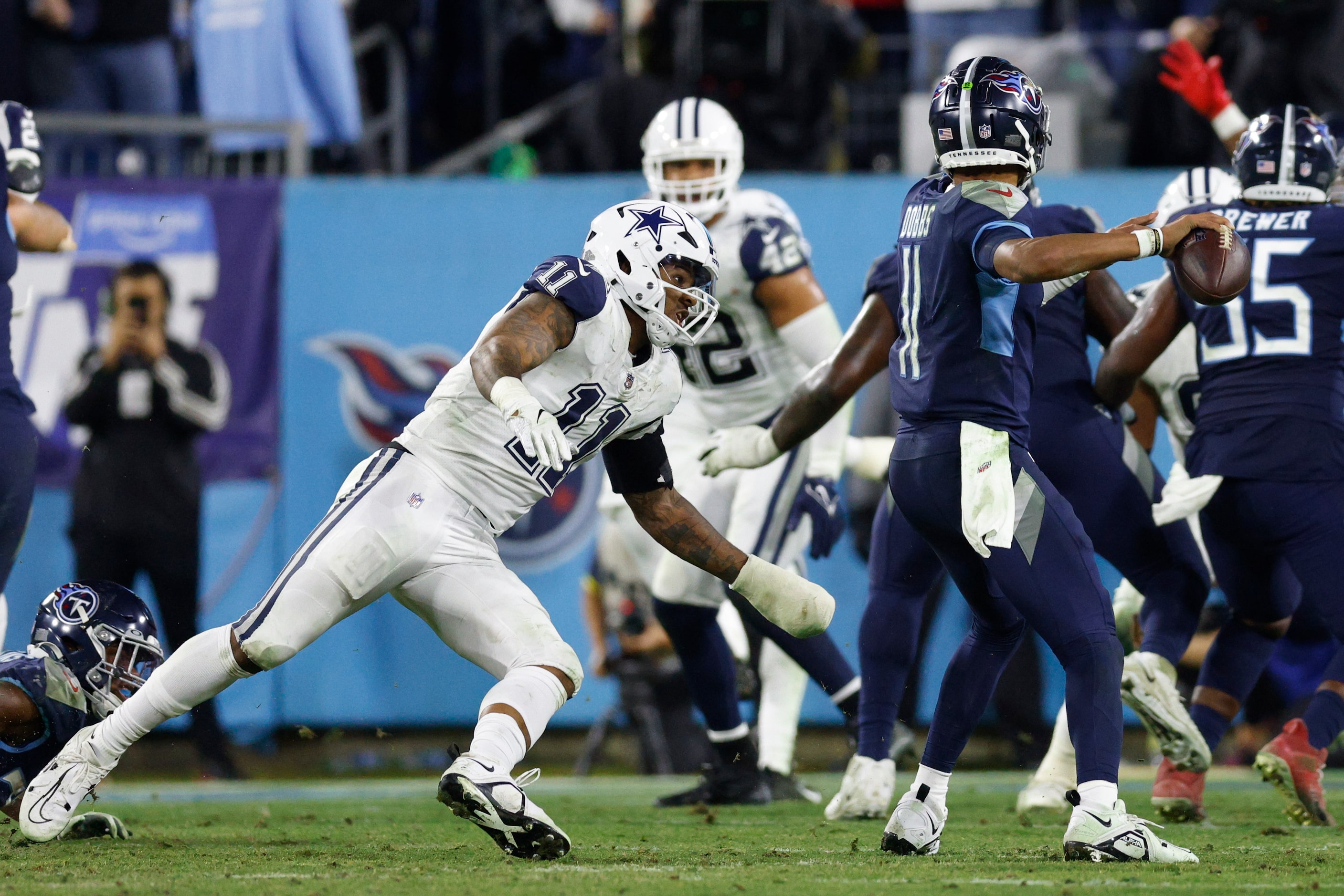 Dallas Cowboys linebacker Micah Parsons (11) pressures Tennessee Titans quarterback Joshua...