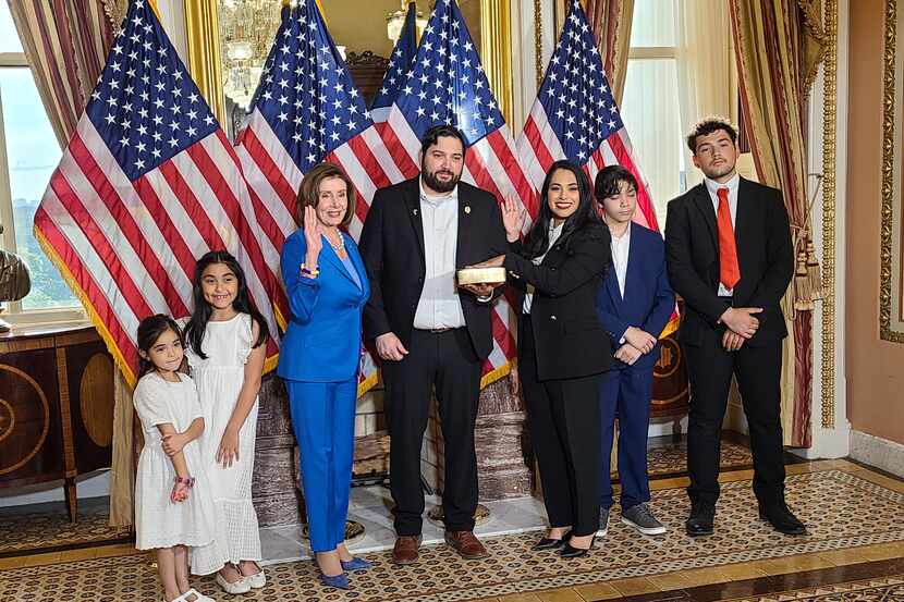 Rep. Mayra Flores, R-McAllen, reenacts her oath of office with Speaker Nancy Pelosi on June...