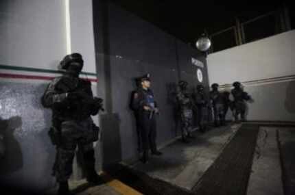  Police stood guard before the arrival of Hector "El Guero" Palma Salazar, member of the...