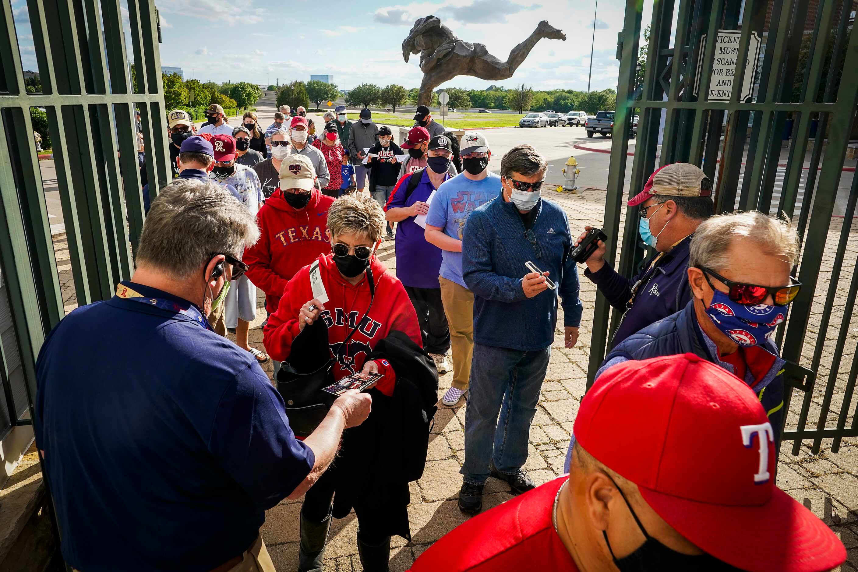Fans stream into the stadium as the gates open  before the Frisco RoughRiders season opener...