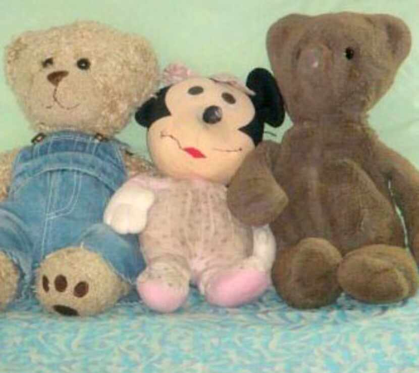 Minnie Mouse (center), a beloved stuffed toy belonging to Leslie Cohn-Wein, has been a...