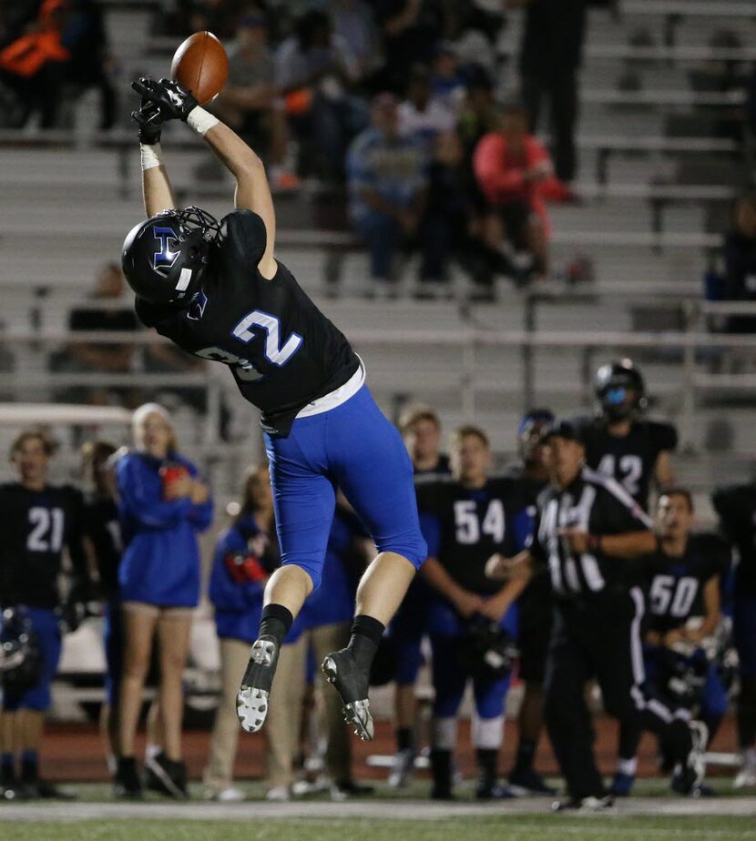 Hebron receiver Mark Scott (32) is unable to make a reception while being covered by Plano...