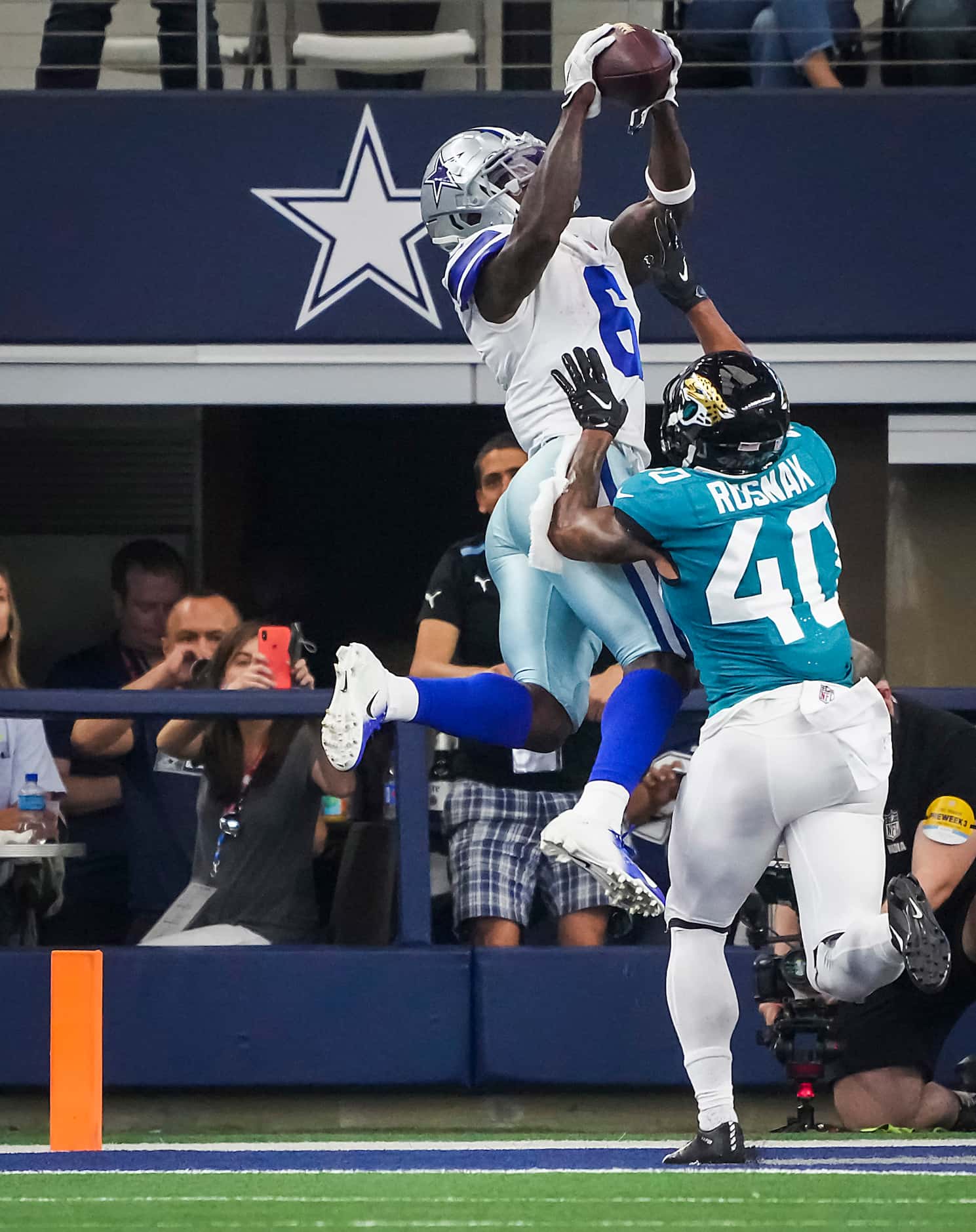 Dallas Cowboys wide receiver Johnnie Dixon (6) catches a touchdown pass over Jacksonville...
