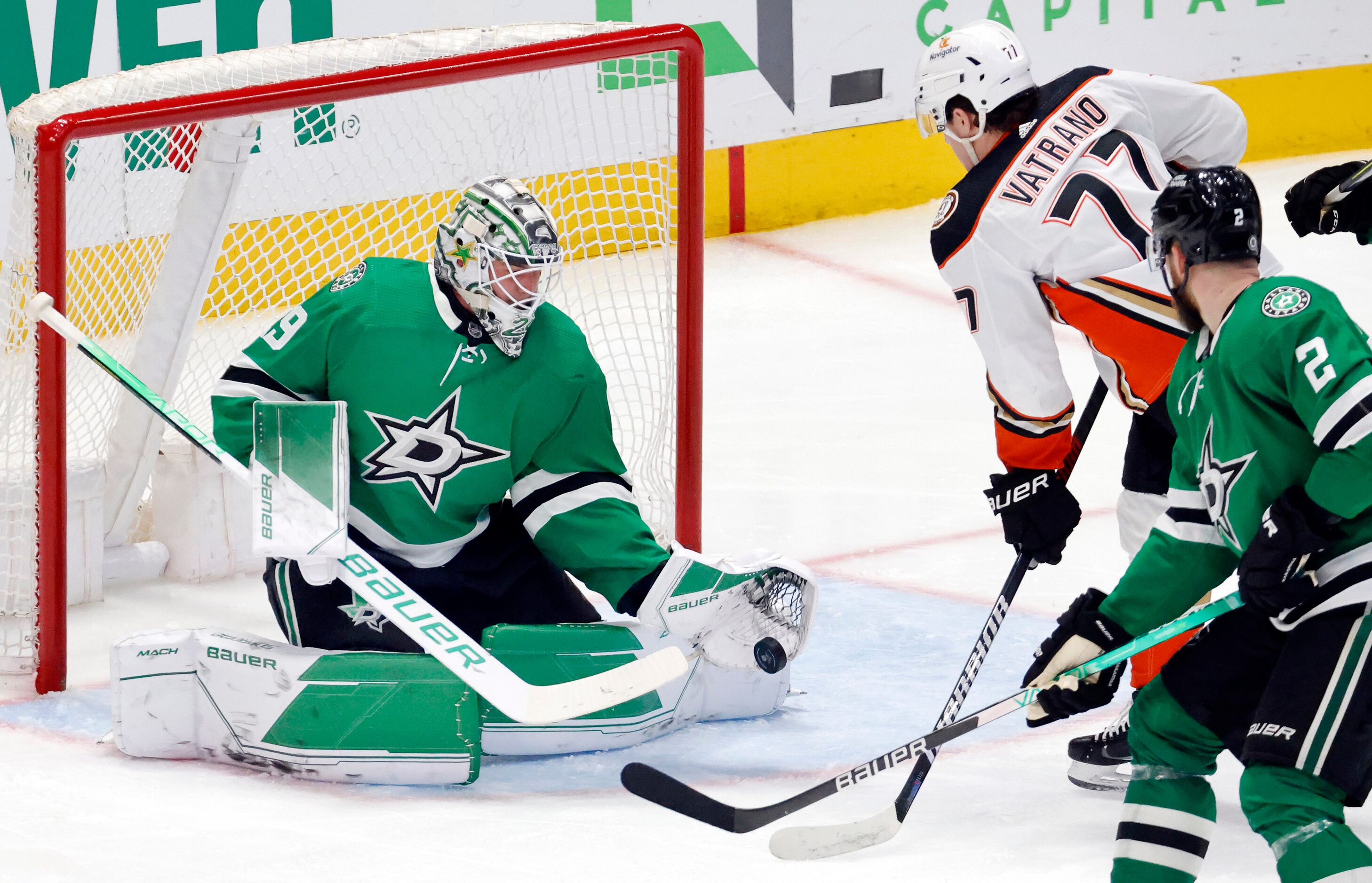 Dallas Stars goaltender Jake Oettinger (29) stops a Anaheim Ducks shot during the second...