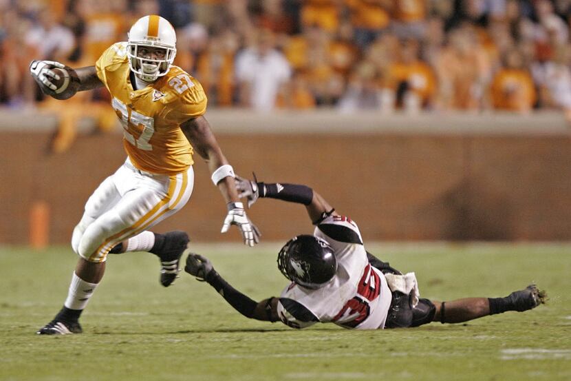 FILE - In this Oct. 4, 2008, file photo, Tennessee's Arian Foster (27) gets past Northern...