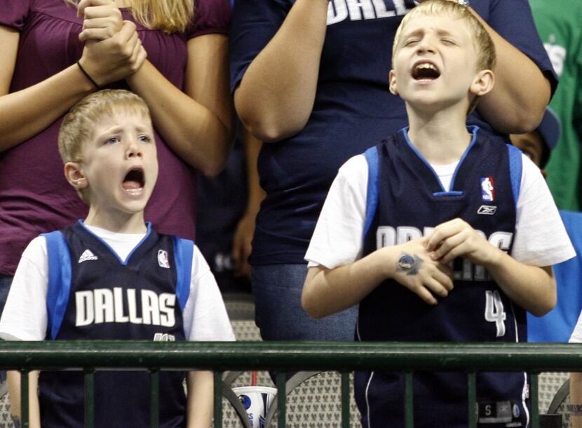 Brothers Anthony (left) and Austin Cooley  of Mesquite learned early to cheer on the...