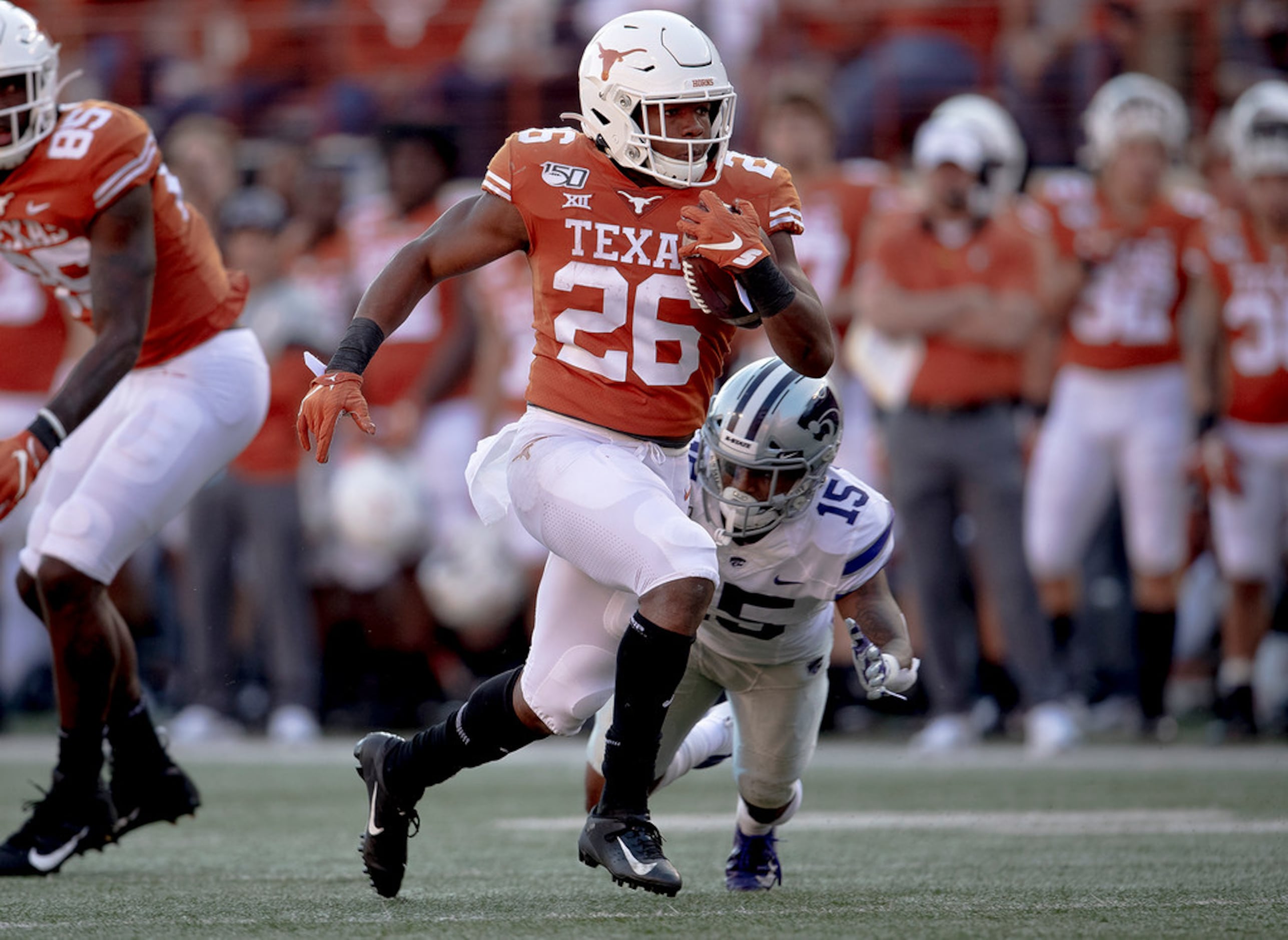Texas running back Keaontay Ingram (26) runs for a touchdown against Kansas State during an...