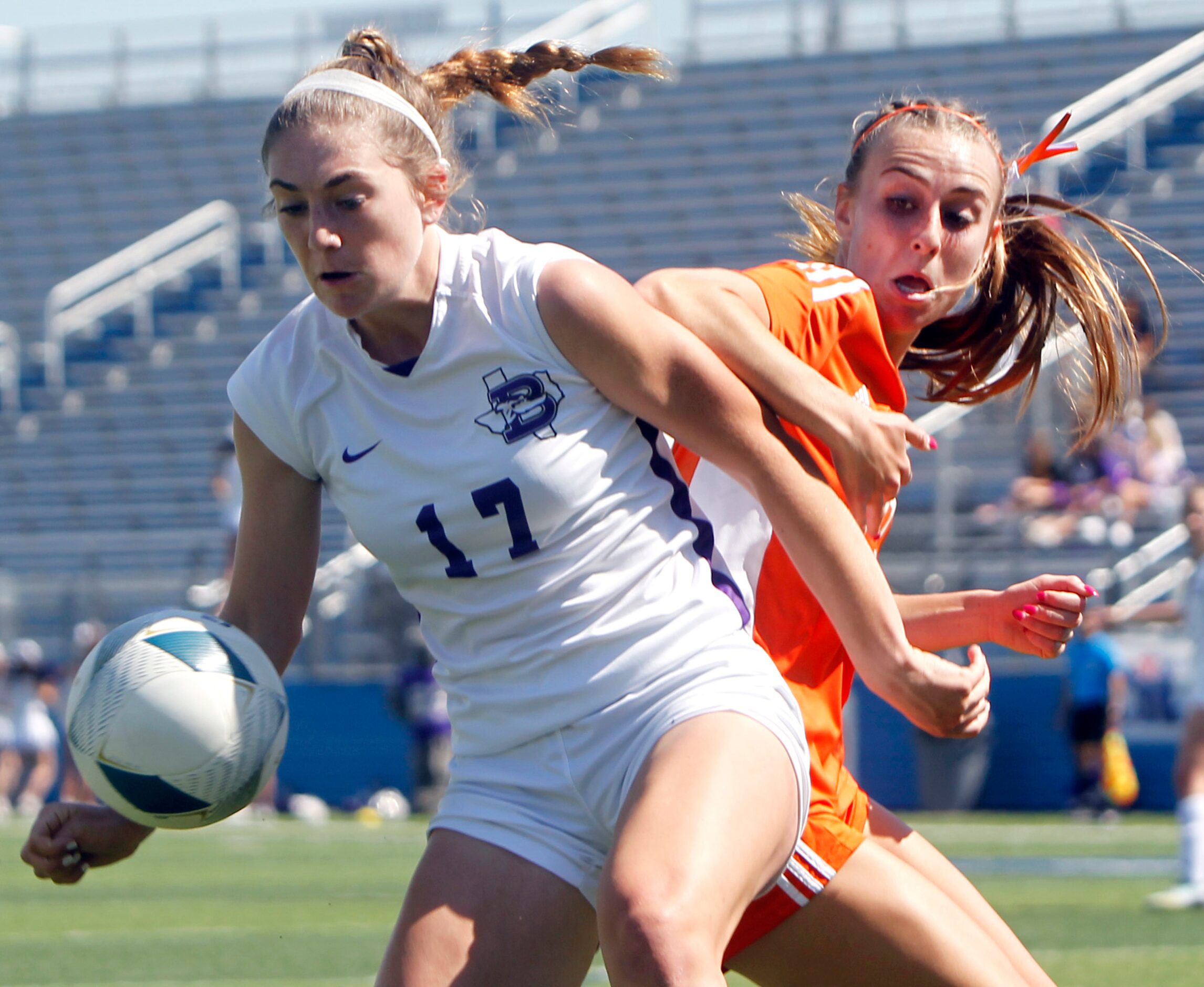 Celina's Lexi Tuite (7), right, challenges Boerne's Kailey Stringfellow (17) during an in...