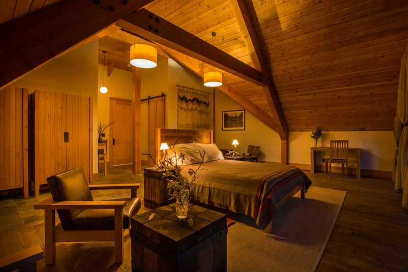 An upstairs bedroom offers a relaxing environment for guests at the Minam River Lodge. 