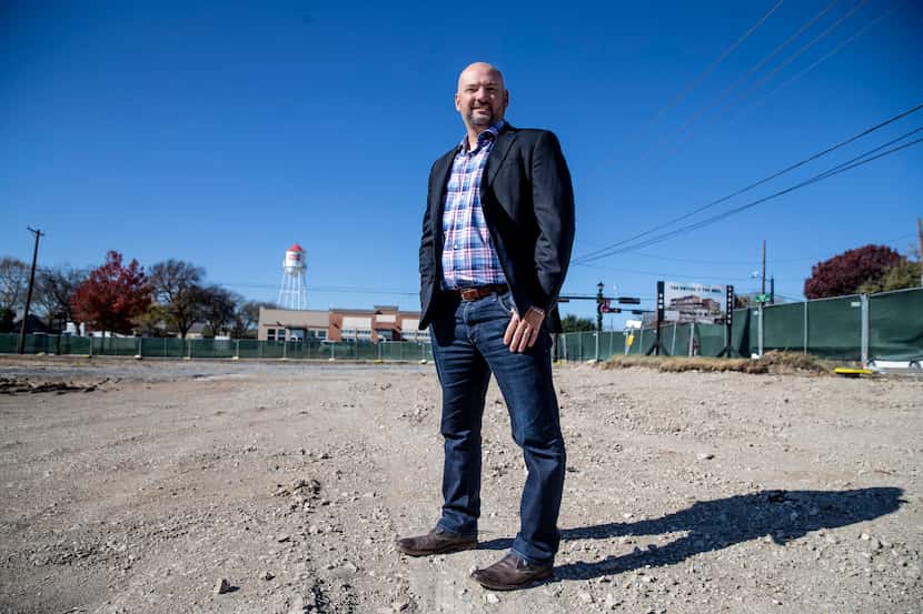 Developer Donny Churchman of Nack Development stands in the lot where he plans to build one...