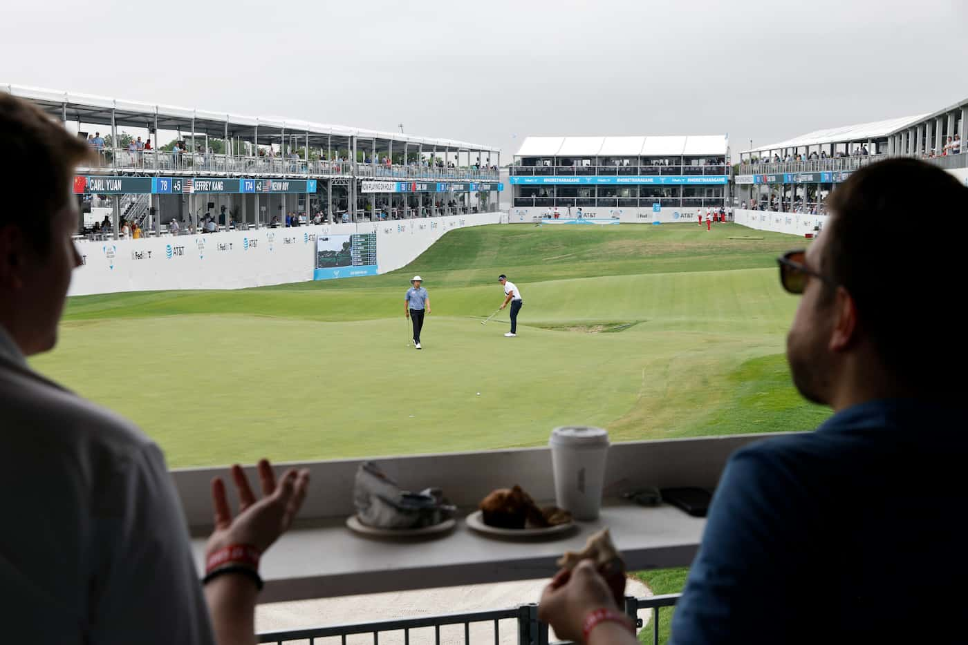 Jatin Davis (left) and Jonathan Carrera (right) talk as Jeffrey Hang, of the United States (...