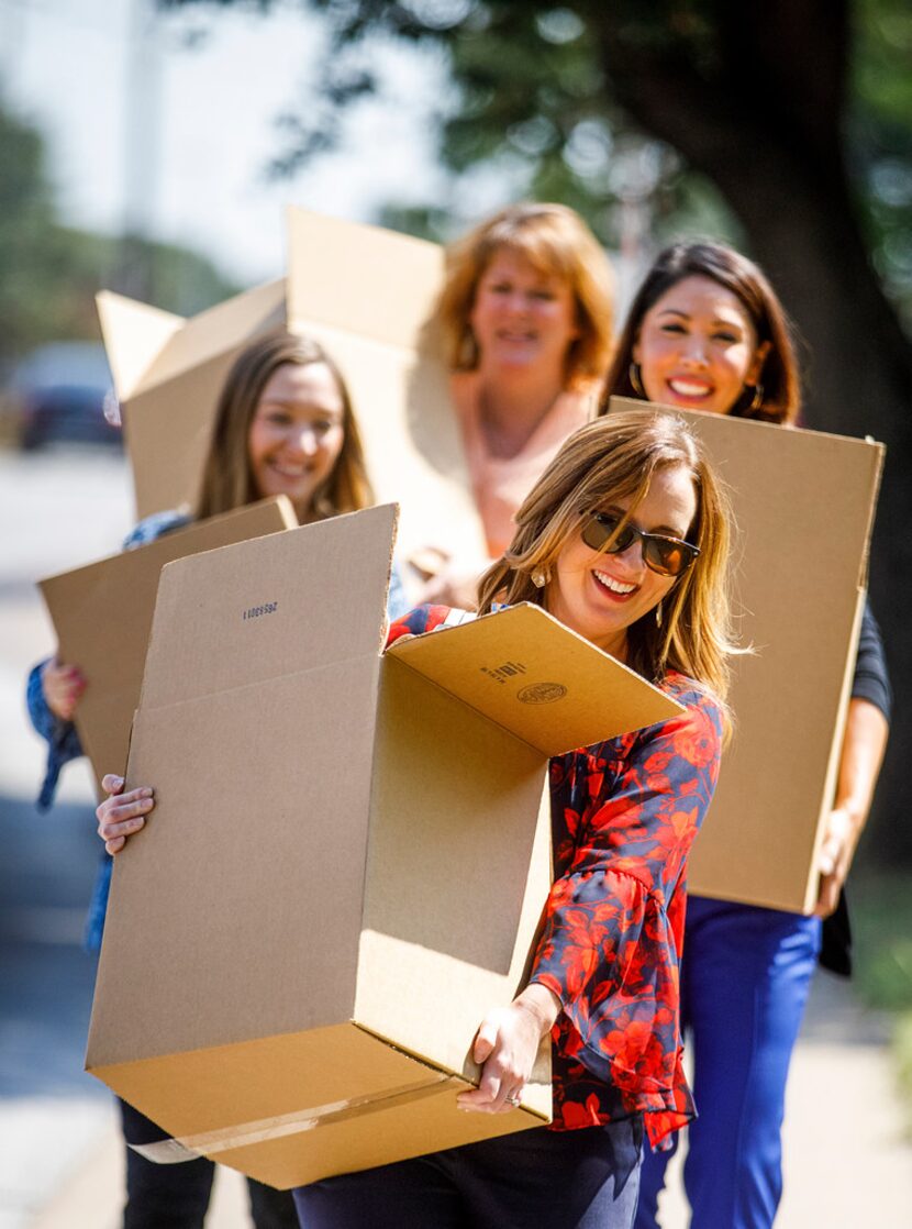 Republic Title employees, clockwise from front, Lindsey Carroll, Brandi Wicks, Patience...