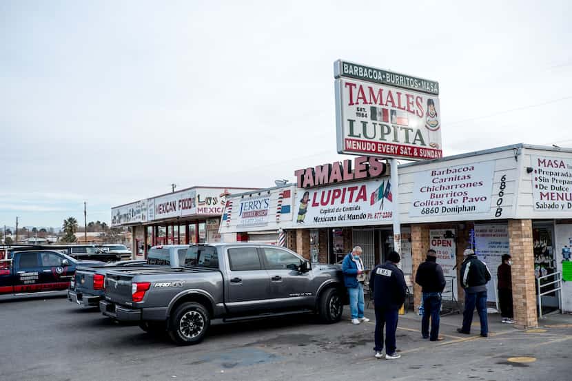 Customers wait in line at Tamales Lupita in Canutillo, Texas, on Friday, December, 18, 2020.