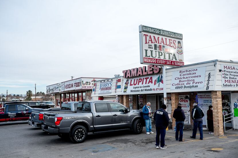 Customers wait in line at Tamales Lupita in Canutillo, Texas, on Friday, December, 18, 2020.
