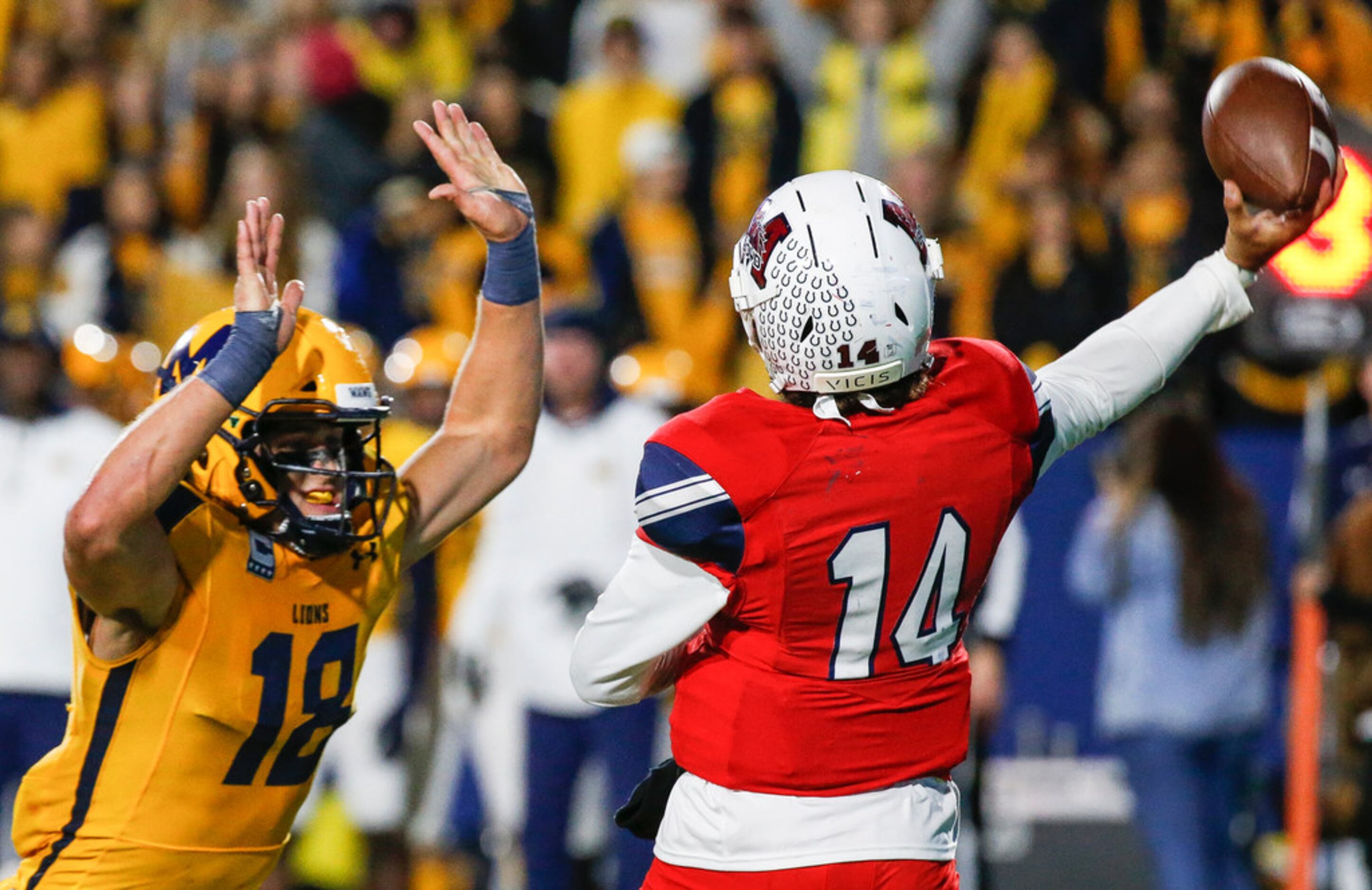 McKinney's Mitchell Tyler (18) looks to block a pass by McKinney Boyd's Carter Whitefield...