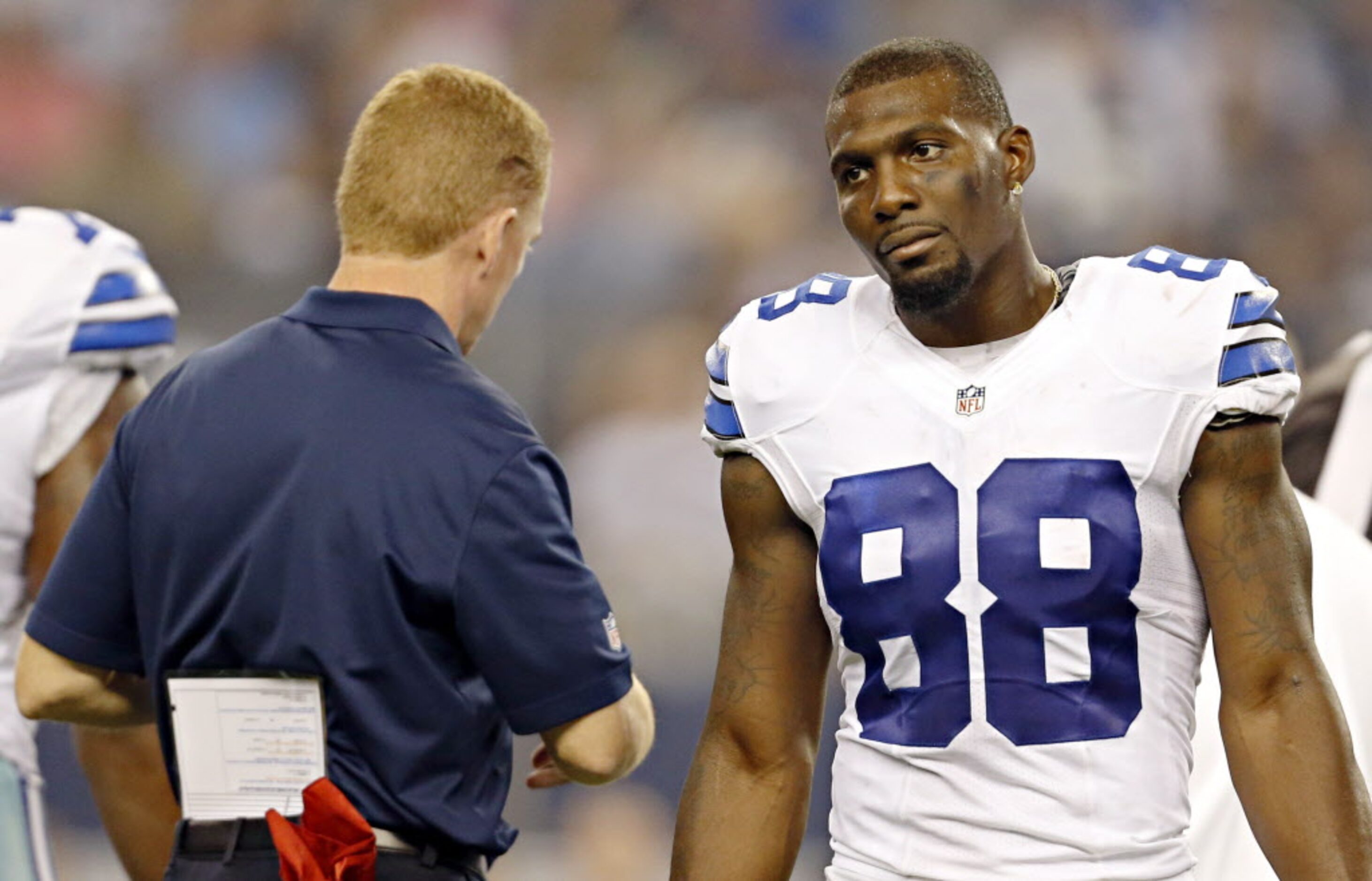 A dejected-looking Dallas Cowboys wide receiver Dez Bryant (88) walks away from an injured...