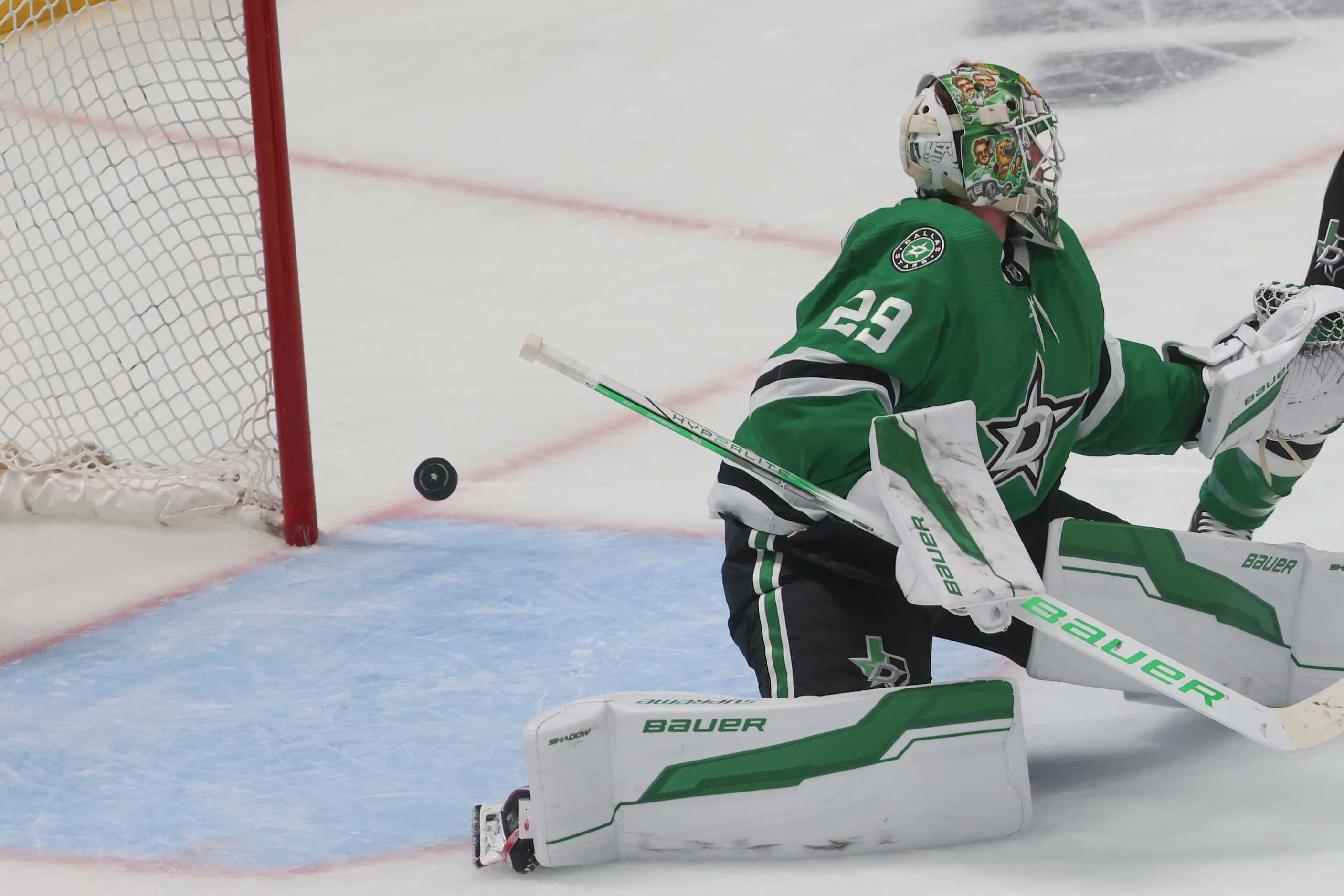 Dallas Stars goaltender Jake Oettinger misses to save the third goal against the Colorado...