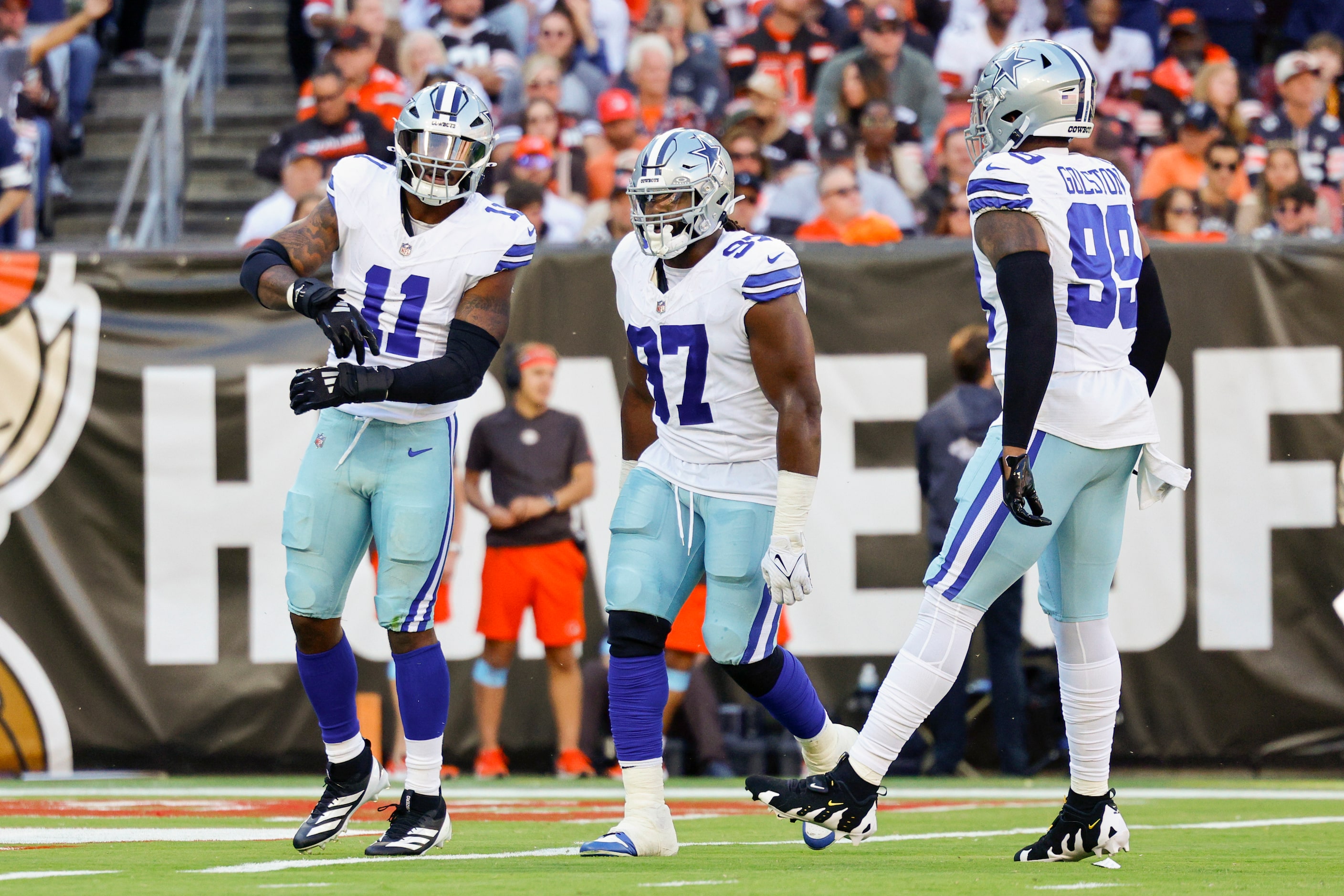 Dallas Cowboys linebacker Micah Parsons (11) celebrates after a sack with defensive tackle...