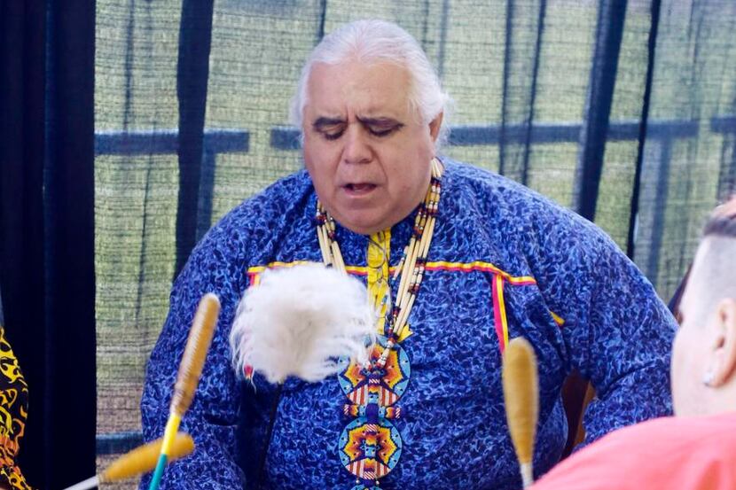 Robert Soto, of the Lipan Apache Tribe of Texas, led the Huisache Creek Singers during the...
