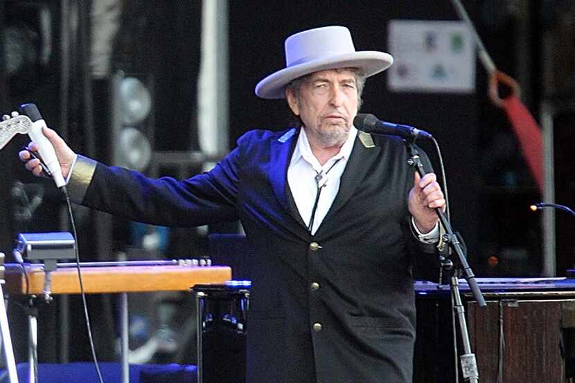FILE - This July 22, 2012, file photo shows U.S. singer-songwriter Bob Dylan performing...