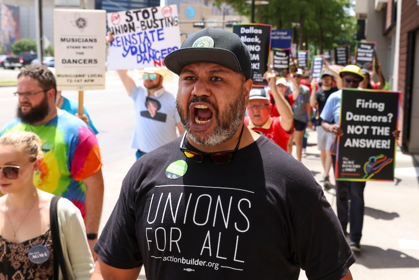 Tevita Uhatafe (front), alongside union members, elected officials and allies from the...