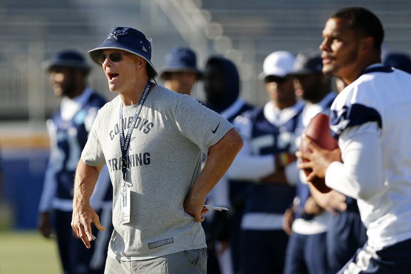 Dallas Cowboys defensive coordinator Rod Marinelli (left) yells at his players as...