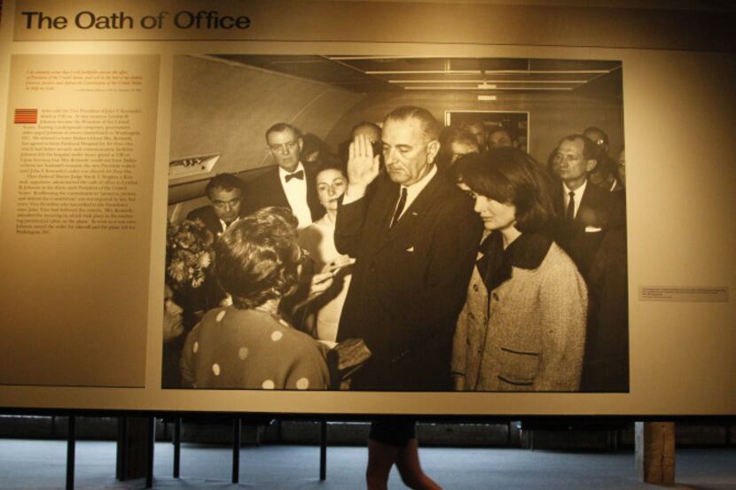 A display at the Sixth Floor Museum shows Lyndon B Johnson being sworn in as president.