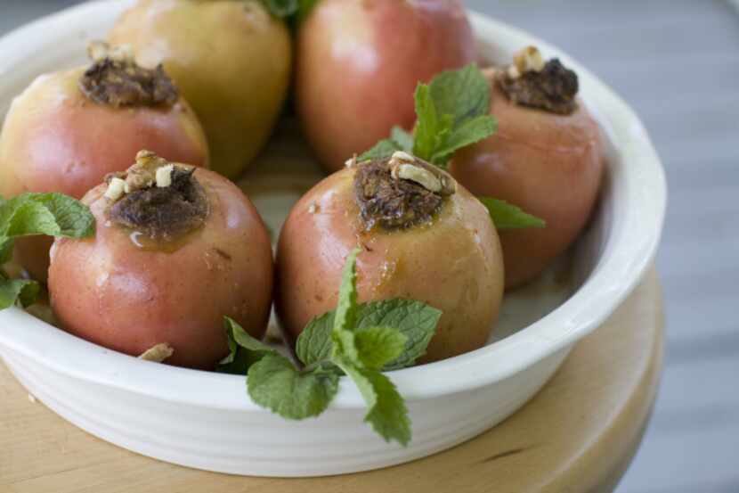 Baked Honey-Date Apples can represent wishes for a sweet year to come at Rosh Hashana. Other...
