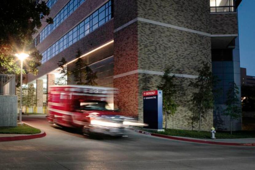 
An ambulance leaves Texas Health Presbyterian Hospital, where an Ebola patient’s condition...