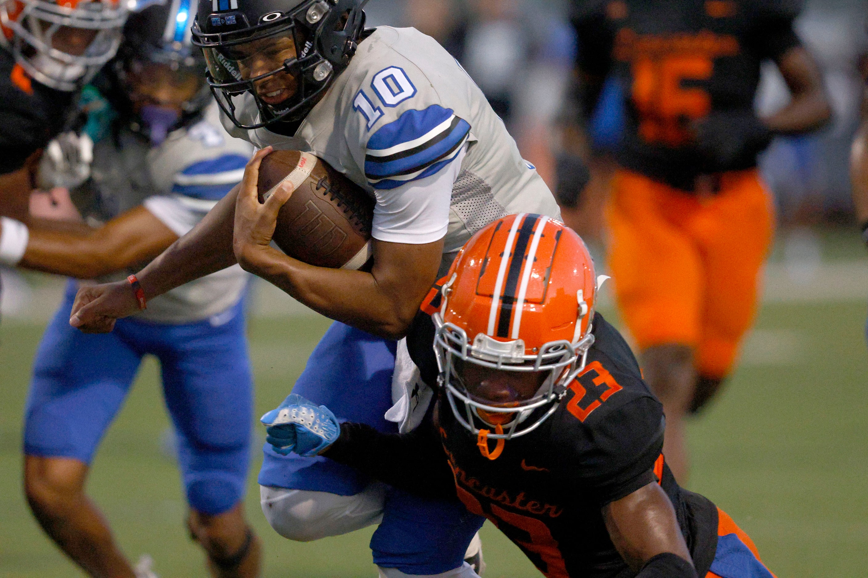 Hebron’s Patrick Crayton Jr. (10) scores a touchdown over Lancaster’s Nathan Keeton (23) in...