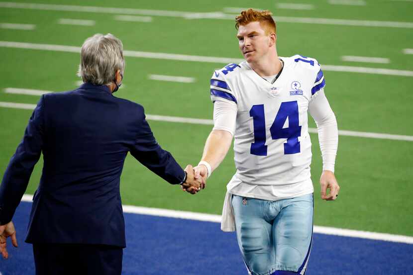 Dallas Cowboys quarterback Andy Dalton (14) receives congratulations on the teams win over...