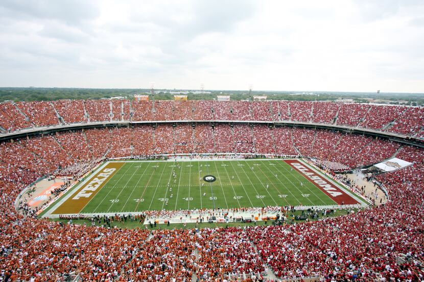 Fans cheer during the opening kickoff of the annual Red River Rivalry between Oklahoma and...