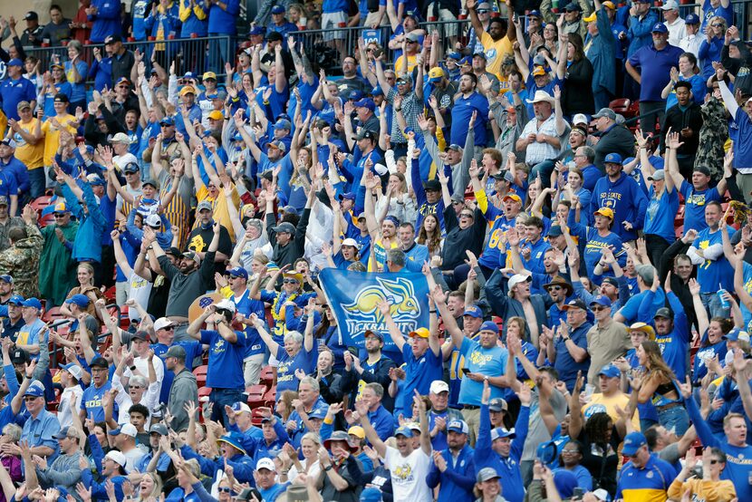 FILE - South Dakota State fans cheer as they play Sam Houston State during the second half...