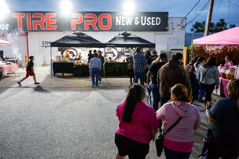 People lined up recently to place orders at Café  Ciro. The pop-up was in the parking lot of...