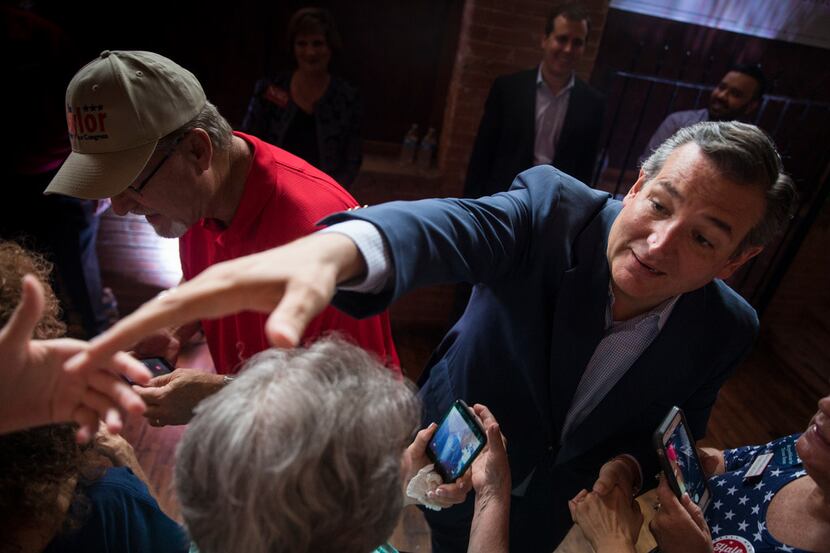 Republican Sen. Ted Cruz greets supporters before speaking at a Collin County Republican...
