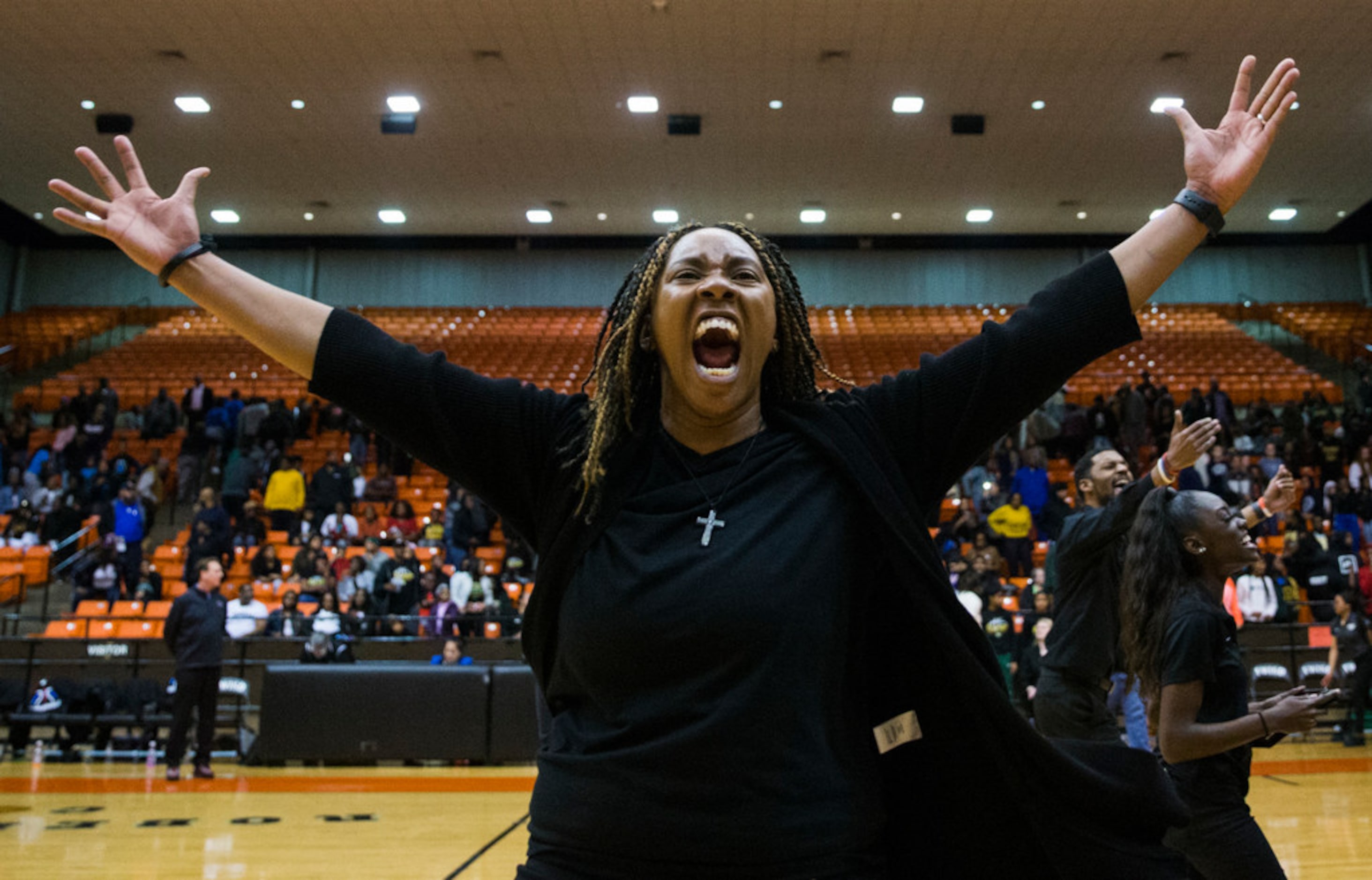 Duncanville head coach LaJeanna Howard celebrates a 47-43 win after a Class 6A Region I...